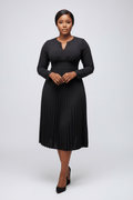 Woman wearing a black dress on a white background