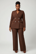 Woman wearing a brown suit on a white background